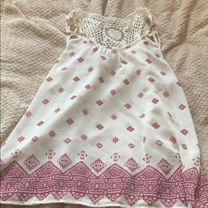 Sheer tank top with lace panel on the back